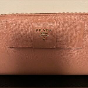 Prada Saffiano Fiocco Bow Zippy Long Wallet in the color Orchidea. With COA